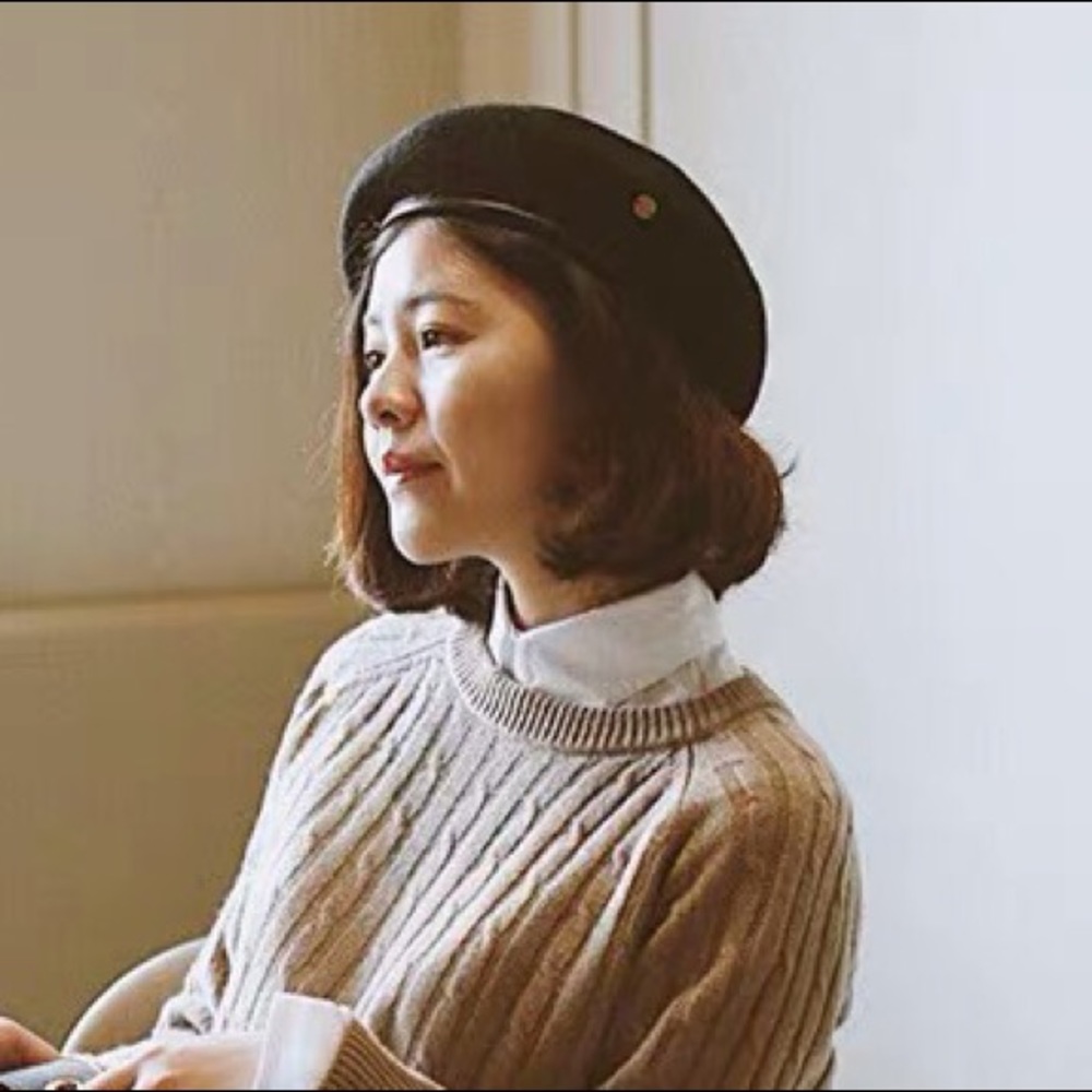 Wool fisherman hat with leather hem